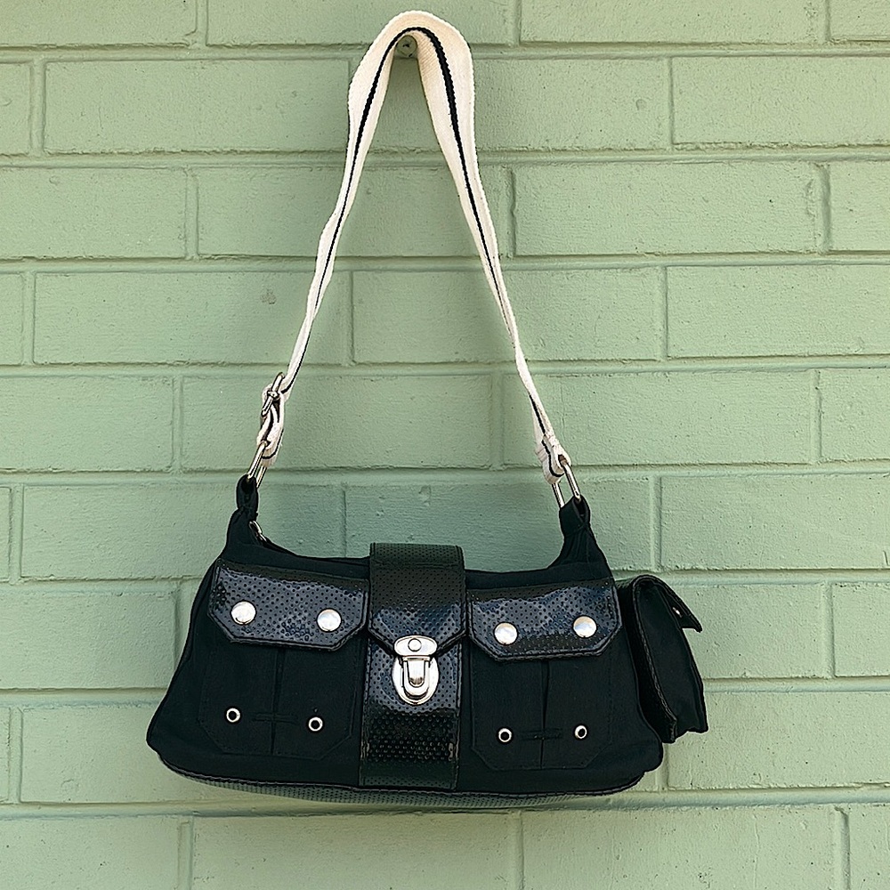 Black canvas shoulder bag with black and white stripe wide strap